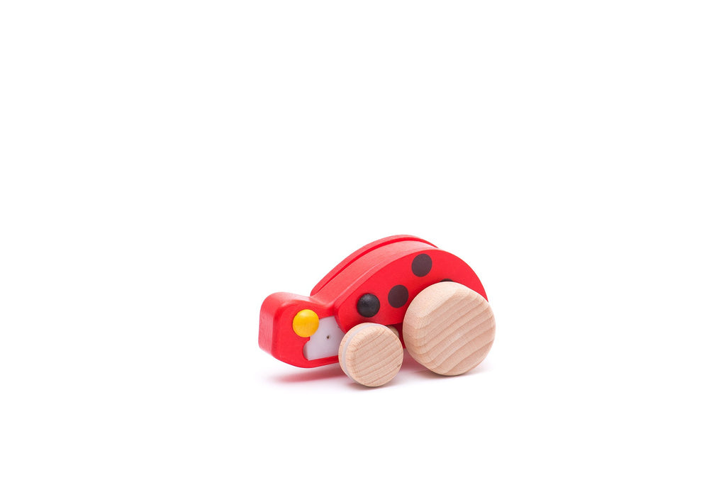 Wooden ladybug with pull-back action